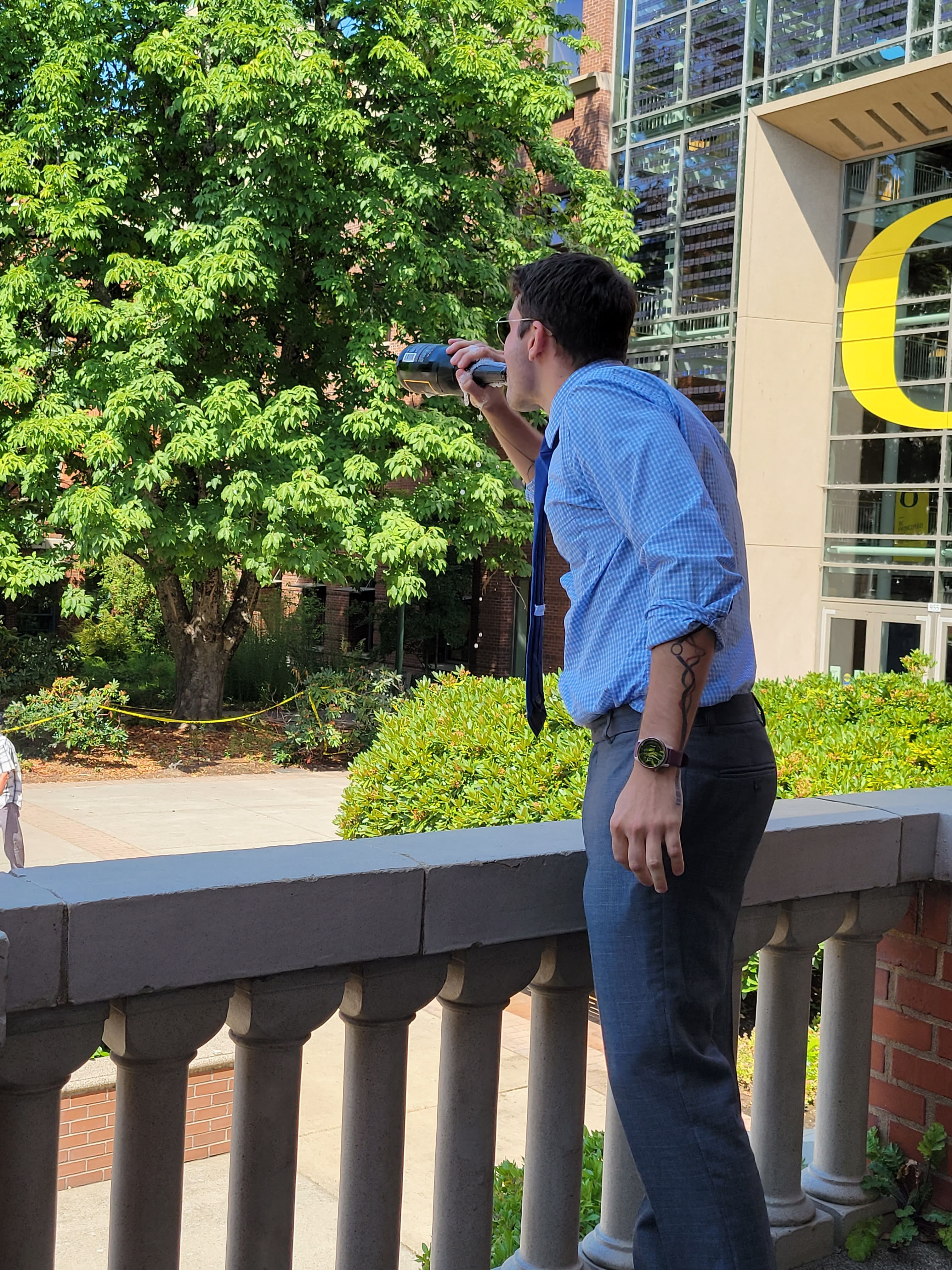 Celebrating with some champagne.